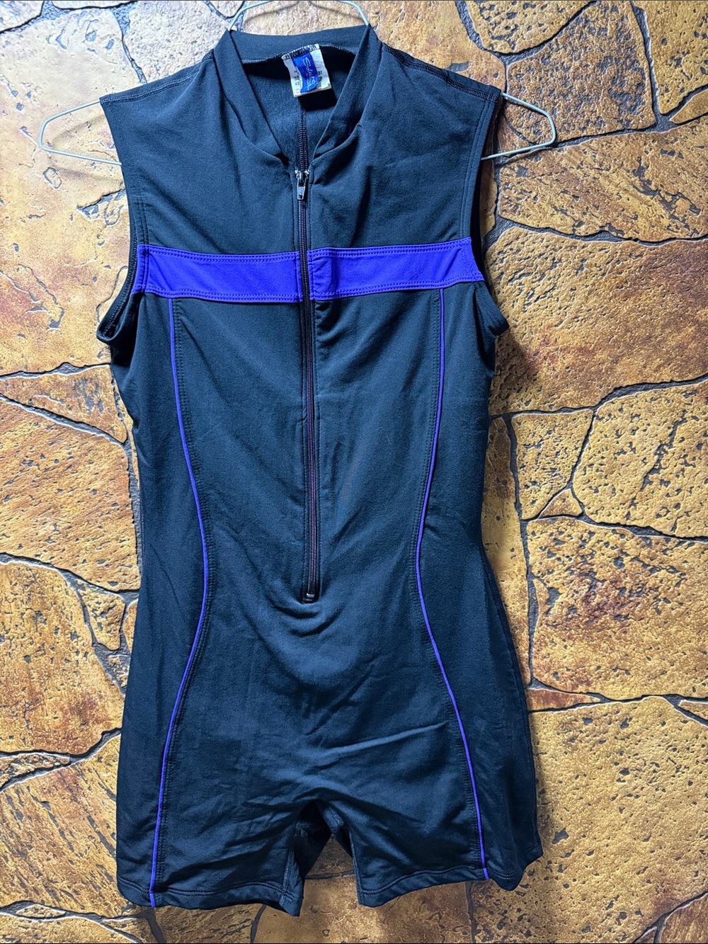 Black Sleeveless Athletic Romper with Purple Accents.      #13
